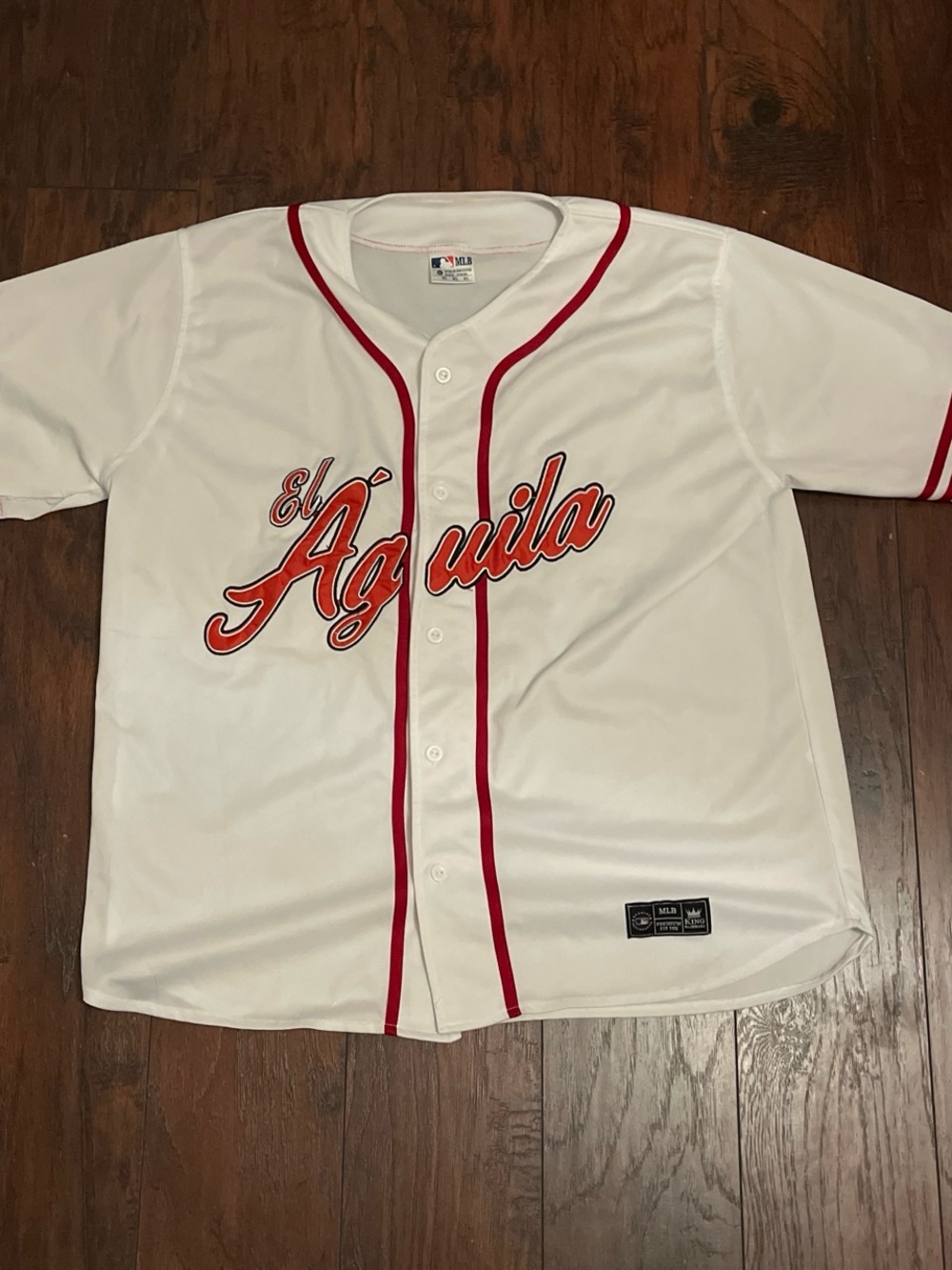 MLB White Jersey with Red Trim and Orange Script "El Águila"